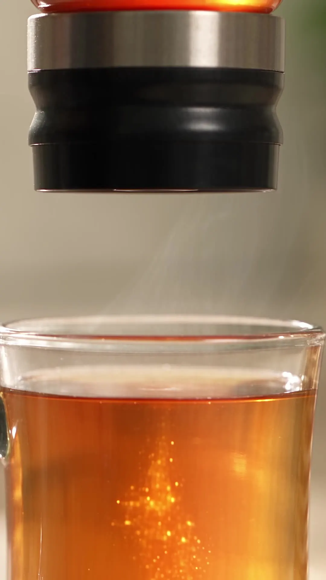 The clean valve on the bottom of the dispenser after pouring